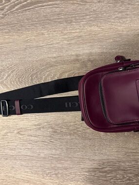 Coach Maroon Leather Sling Bag with Black Logo Strap